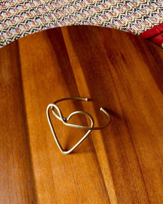 THE HEART'S ARC | BRASS HANDCUFF