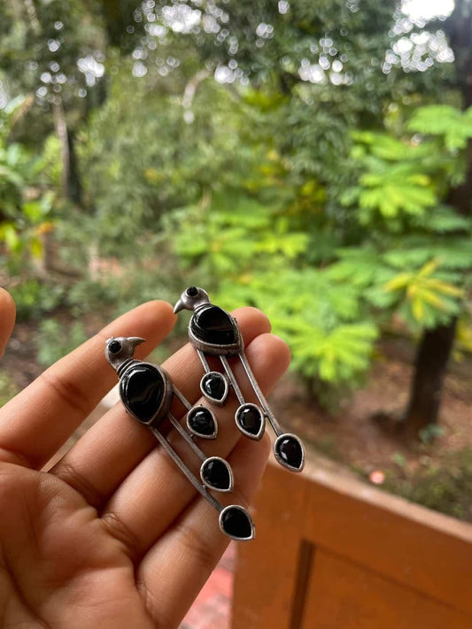 PARROT STATEMENT STUDS