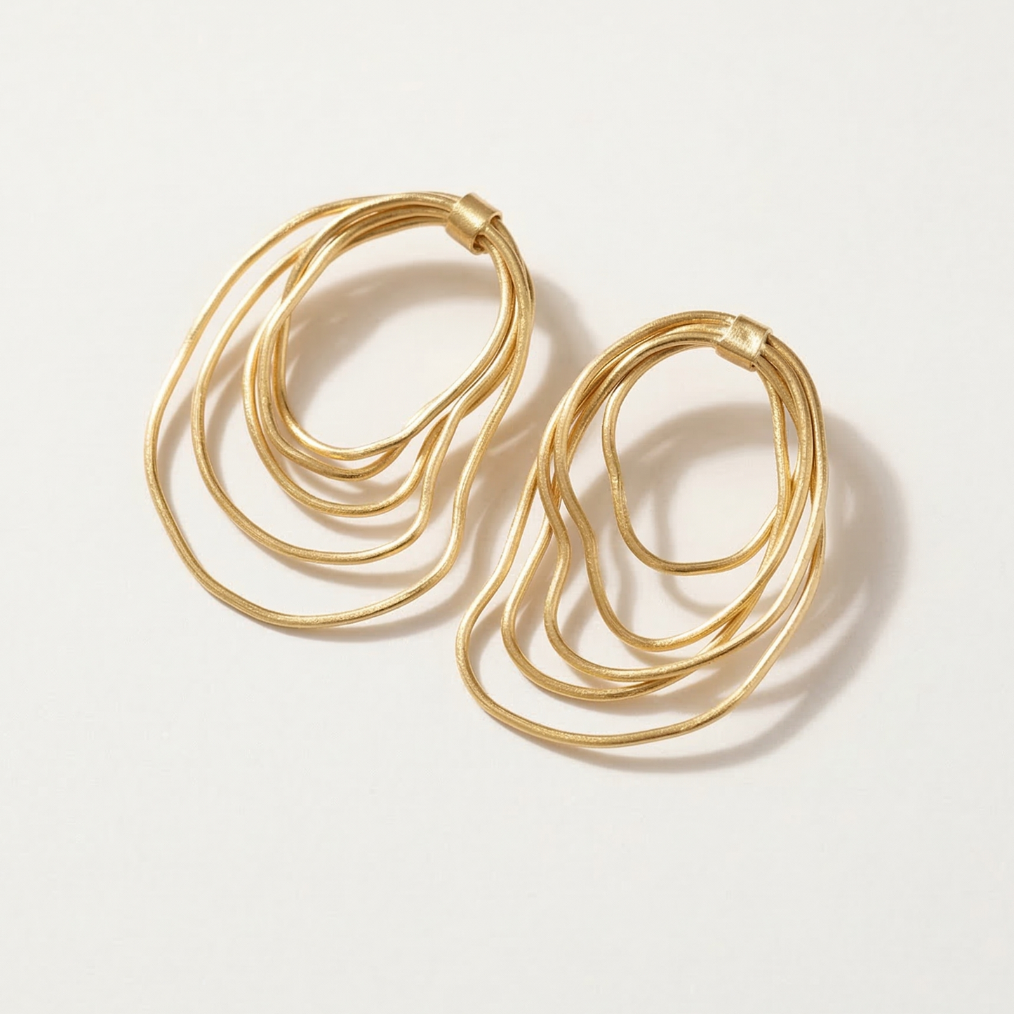 Selena Hoops, layered wave brass hoop earrings by House of Vandy