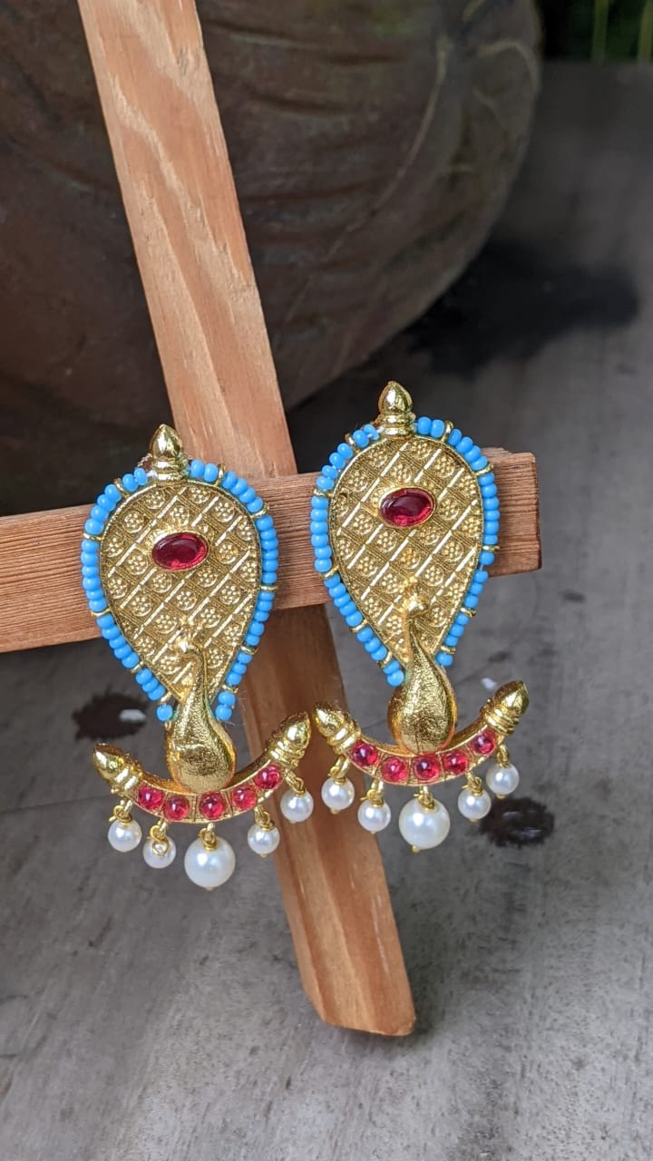 BLUE POLKI KEMP PEACOCK STUD