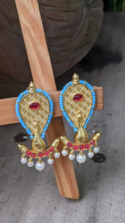 BLUE POLKI KEMP PEACOCK STUD