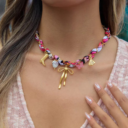 The Rosette Charm Braid Necklace | Pink Fabric & Gold-Tone Accessory